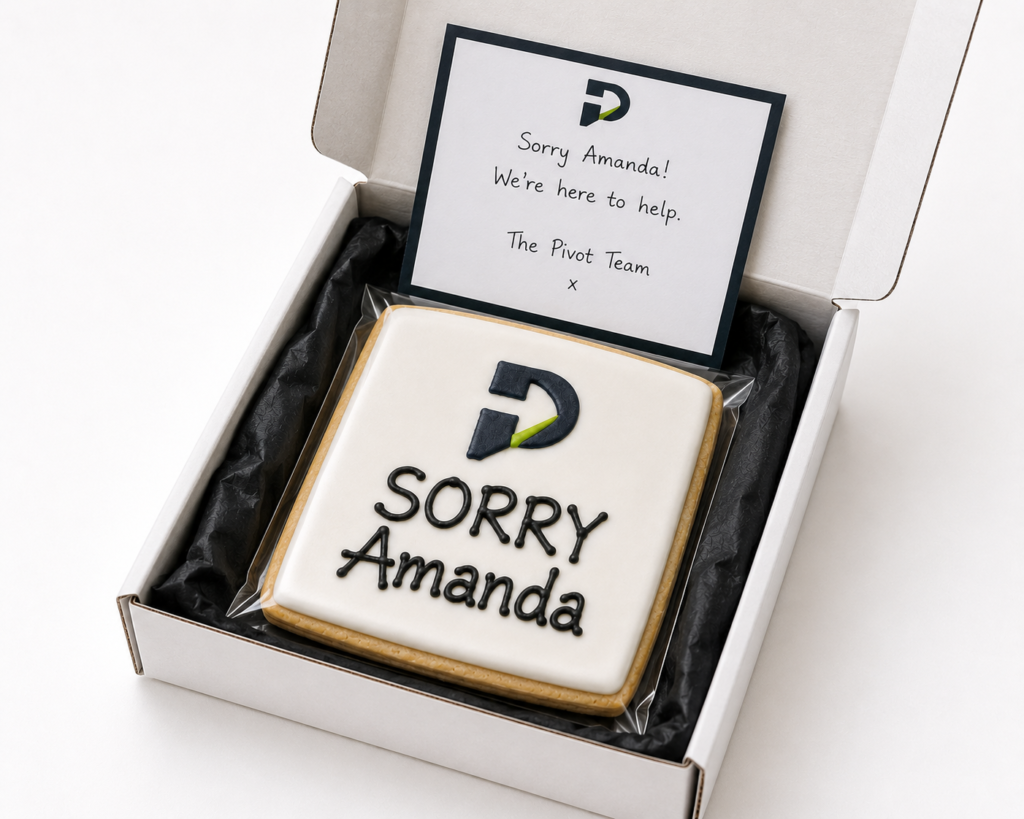 Personalised Sorry cookie with company logo and handwritten customer message in presentation box